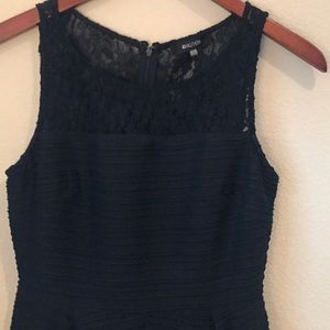 Black cocktail dress with lace bottom